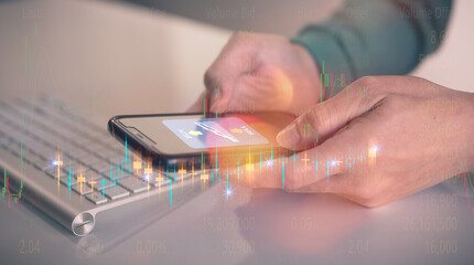 financial investment concept, businessman typing on computer keyboard  touching virtual trading graph buy and sell share in concept of investment business growth and marketing