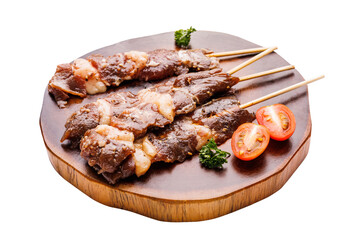 Delicious grilled meat and other ingredients falling on white background