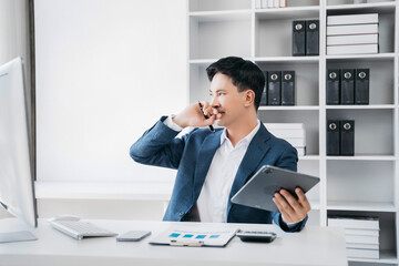 Naklejka premium Overworked, tired businessman, tired male. sleeping in office Business man using laptop digital tablet smartphone at home entrepreneurship, business, freelance, stress concept.