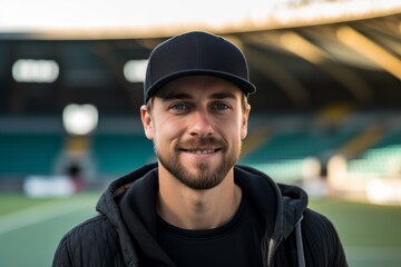 Close-up portrait photography of a satisfied boy in his 30s wearing a cool cap or hat against a sports stadium background. With generative AI technology