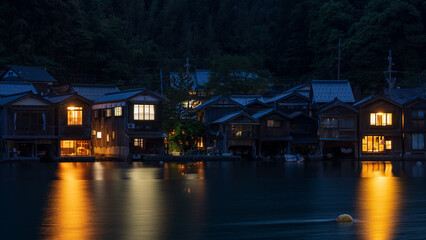 Night view of  traditional boathouses at Ine Town in Kyoto, Japan. - Powered by Adobe