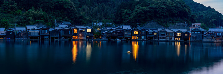 Night view of  traditional boathouses at Ine Town in Kyoto, Japan.
