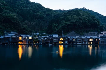 Tafelkleed Night view of  traditional boathouses at Ine Town in Kyoto, Japan. © hit1912