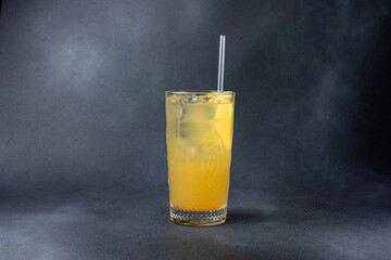 Delicious alcoholic cocktail on a dark background
