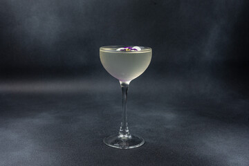 Delicious alcoholic cocktail on a dark background