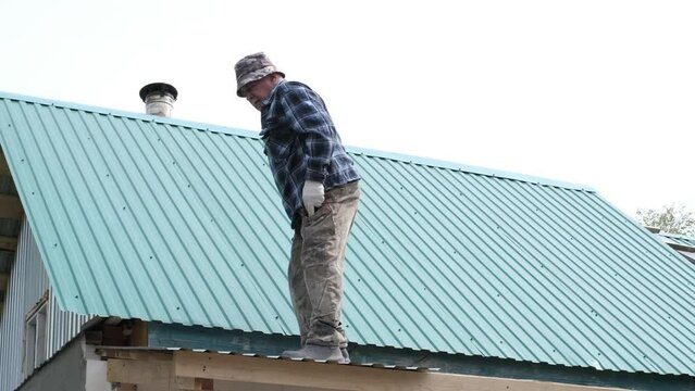 seasoned Mexican elder single-handedly conducts roof repairs, reminding us of the invaluable knowledge and capabilities that come with age.