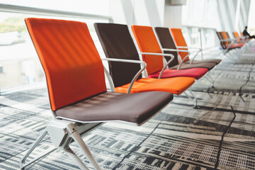 Row of empty chairs at Changi airport, Singapore.