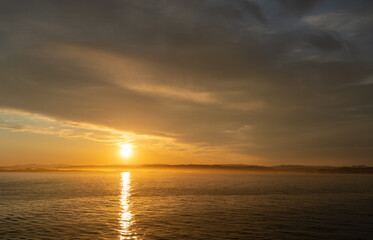 Beautiful sunset with clouds  in the Norwegian fjords