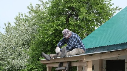seasoned Mexican elder single-handedly conducts roof repairs, reminding us of the invaluable knowledge and capabilities that come with age.