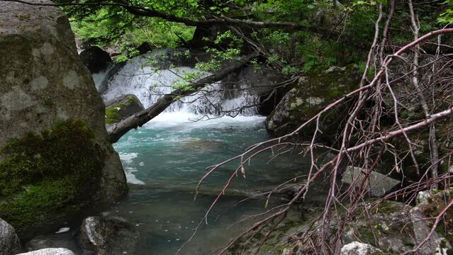 The blue waterfalls of Amola, a natural spectacle in the Alps