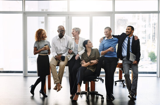 Teamwork, support and happy with business people in office for diversity, community and motivation. Smile, collaboration and solidarity with group of employees for mission, commitment and mindset