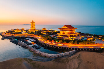 Aerial photo of Eight Immortals crossing the Sea scenic spot in Penglai, Shandong Province at night
