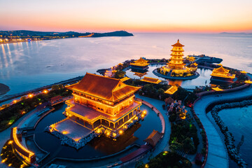 Aerial photo of Eight Immortals crossing the Sea scenic spot in Penglai, Shandong Province at night
