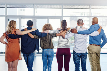 Support, teamwork and hug with back of people for motivation, community and diversity. Solidarity, faith and collaboration with group of friends for trust, gratitude and kindness together