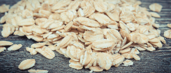 Obraz na płótnie Canvas Rye flakes or oat bran containing dietary fiber and minerals. Nutritious eating