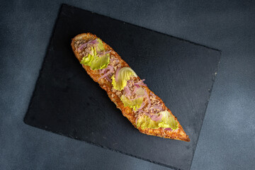 Polish fast food casserole on a dark background