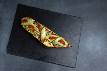 Polish fast food casserole on a dark background