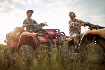 Young couple enjoying a quad  vehicle © luckybusiness