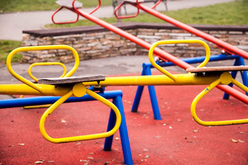Colorful seesaws at the playground with no people