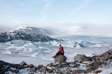  traveler finds himself detained in an impressive landscape of ice inside the Vatnajokull National...