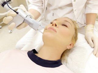 Naklejka premium Laser Treatment,Cosmetic Laser Dermatology ,dermatologist offices,laser technology