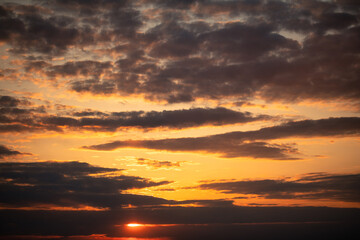 Dramatic Skyline: Sunset Illuminates Clouds or dawn