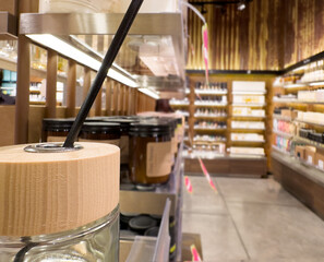 buying make up at cosmetics section in store. choosing cosmetics, perfumes, creams and shampoos, Using tester.