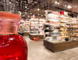 buying make up at cosmetics section in store. choosing cosmetics, perfumes, creams and shampoos, Using tester.