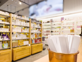 buying make up at cosmetics section in store. choosing cosmetics, perfumes, creams and shampoos, Using tester.