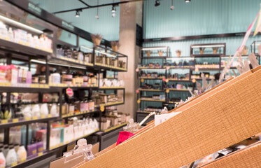 buying make up at cosmetics section in store. choosing cosmetics, perfumes, creams and shampoos, Using tester.