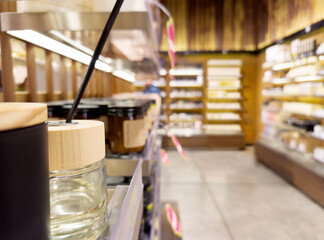 buying make up at cosmetics section in store. choosing cosmetics, perfumes, creams and shampoos, Using tester.