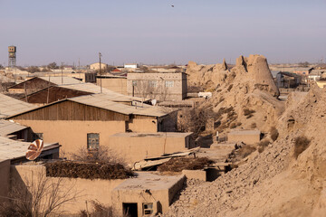 desert land with a habitation in uzbekistan