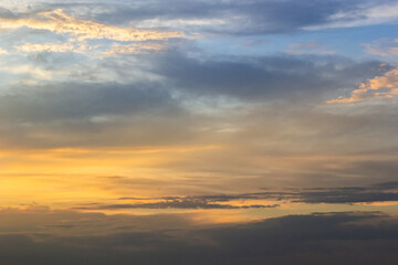 Fototapeta premium sunset sky with multicolor clouds. Dramatic twilight sky background