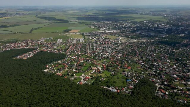 Panoramic aerial footage of Nitra, Slovakia, view of the city near the mountain
