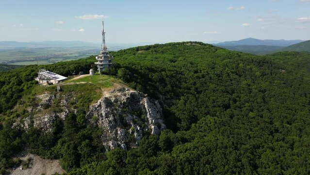 Aerial view of Zobor Mountain and the Pyramid Radio tower on the cliffs, 4k