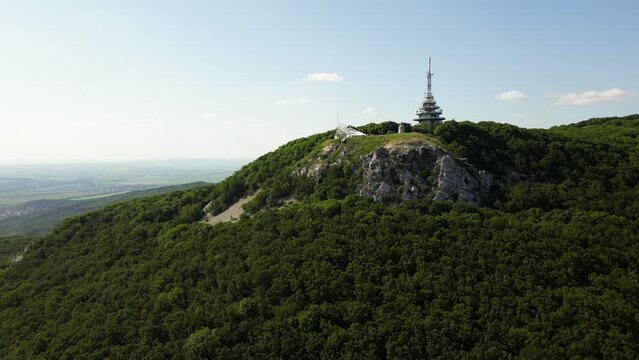 Aerial view of Pyramid Radio tower on top of the cliffs of Zobor Mountain, 4k