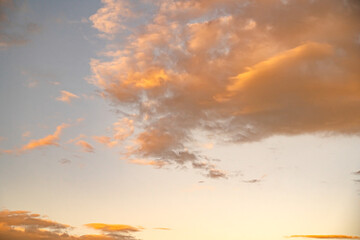 Yellow sunset in blue sky. Sky clouds