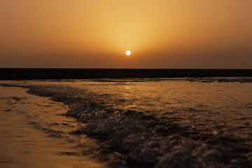 Fototapeta premium Beautiful sunset over the sea.Summer vacation, sea and mood