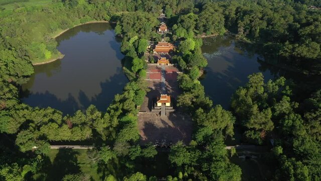 Minh Mang tomb near the Imperial City with the Purple Forbidden City within the Citadel in Hue, Vietnam. Imperial Royal Palace of Nguyen dynasty in Hue. Hue is a popular