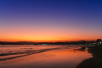 Fototapeta na wymiar Sunset on Santos beach in autumn