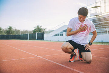 Obraz premium Man runner have chest pain while practice running at the race track with visual effect.