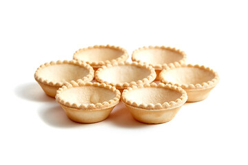 Tartlet shells isolated on white background. Empty mini tart shells for portable desserts