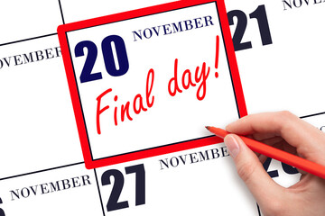 Hand writing text FINAL DAY on calendar date November 20.  A reminder of the last day. Deadline. Business concept.