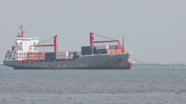 PORTUGAL, LISBON 10-25-2022: cargo ship sail river