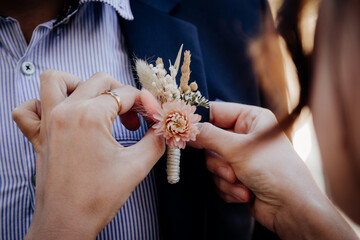 hands of a person with a pearl