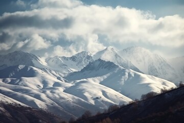Obraz premium majestic mountain range, with peaks covered in fresh snow and clouds, created with generative ai