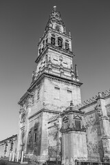 Fototapeta na wymiar Tower of the Mosque Cathedral of Cordoba in Andalusia, Spain; Cathedral of Our Lady of the Assumption in black and white