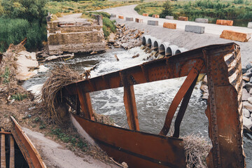 Bridge on the river, destroyed by the water flow. Catastrophe, natural disaster, flood