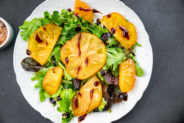 fresh salad yellow tomato green leaf lettuce healthy meal food snack on the table copy space food background rustic top view  