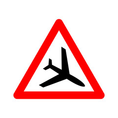 Low flying aircraft sign. Warning sign about low-flying aircraft. Red triangle sign with an airplane silhouette inside. Caution, planes. Beware helicopter at low altitude. Droga near airport.